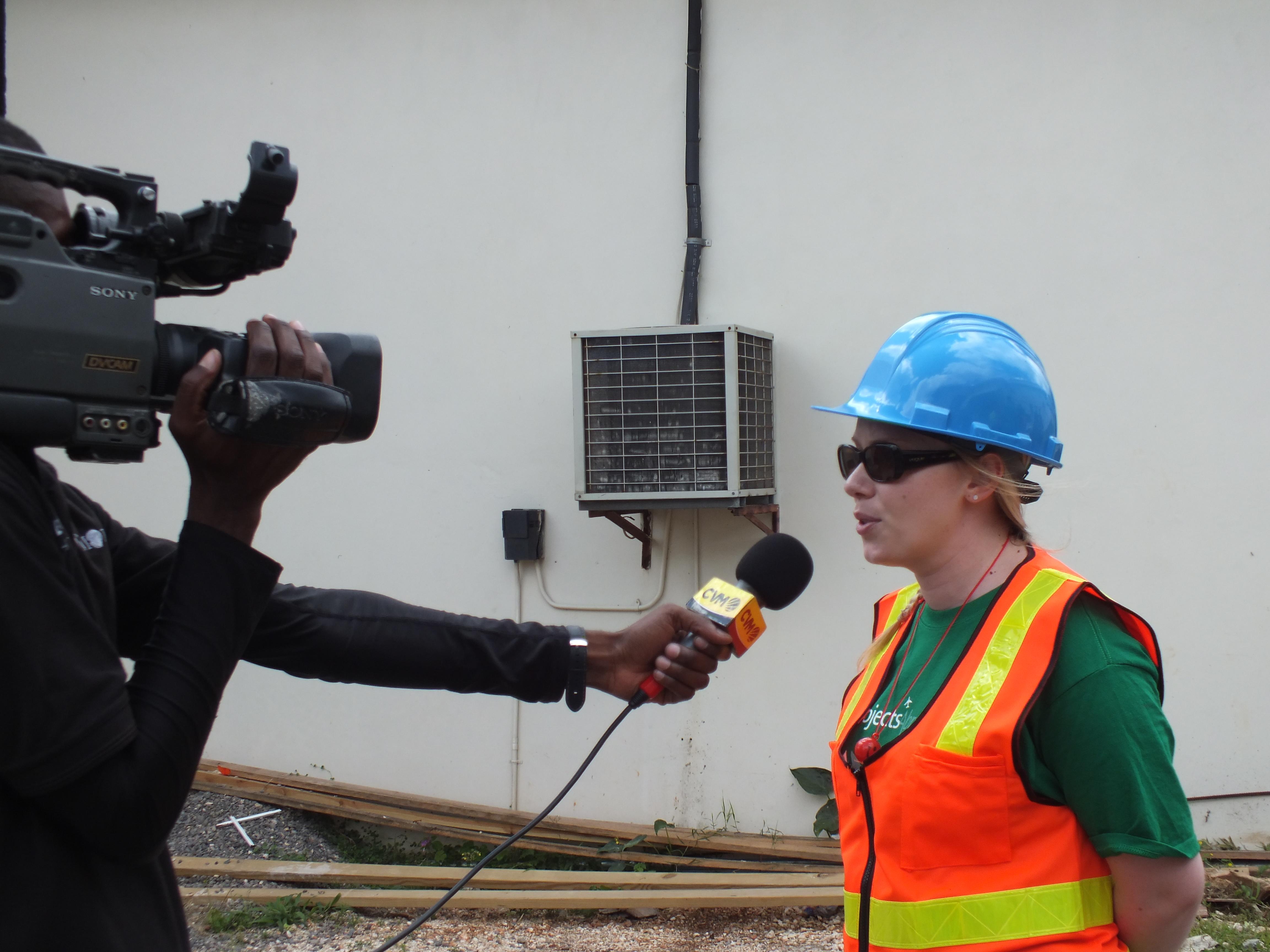 Female Projects Abroad Disaster Mangement intern is being intervied by a local TV station during Disaster Management internships in Jamaica. Female International Development intern is interviewed by a local TV station during her Work Experience in Distaster Management in Jamaica.